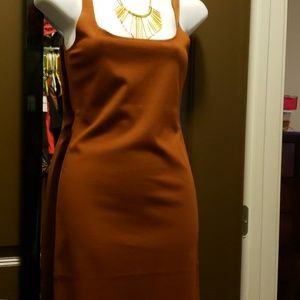 Orange form fitting dress
